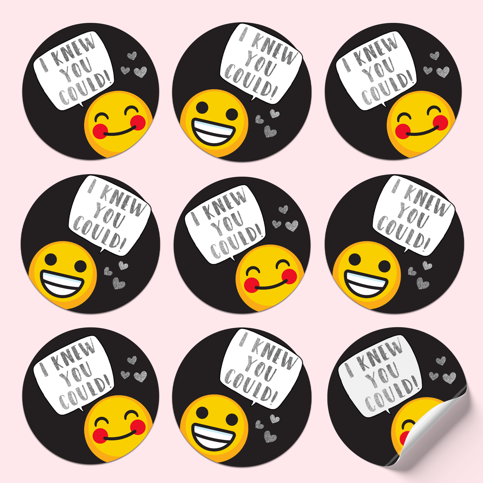Sticker sheet with happy emojis on a black background, silver foiled hearts, and speech bubbles with silver text saying 'I knew you could!'