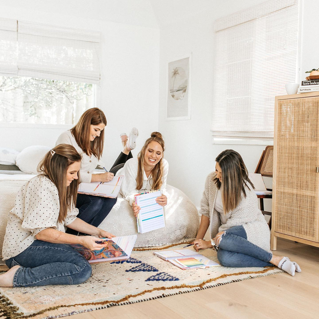 four teachers with teacher planner