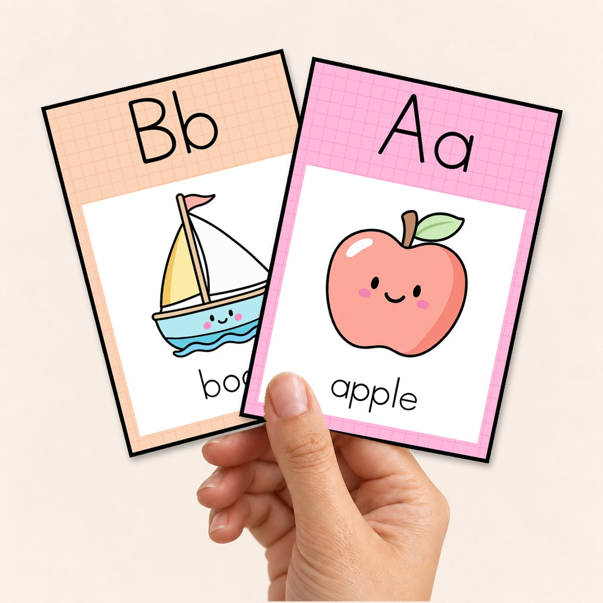 Alphabet flashcards A6 size held in hand, printed four to a page and cut