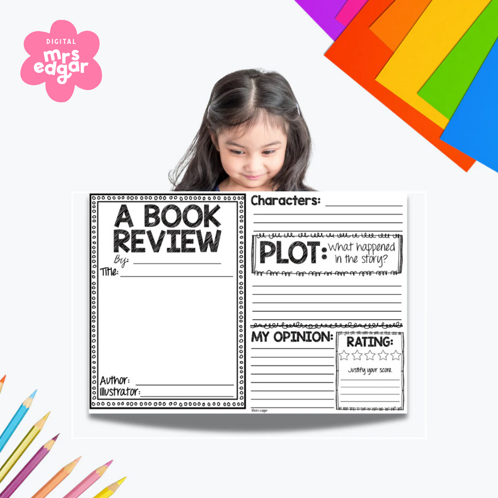 A young girl holds a black and white book review worksheet with sections for title, author, illustrator, plot, characters, opinion, and rating. Colourful cardstock is in the background, along with colored pencils, reinforcing a classroom or learning environment.