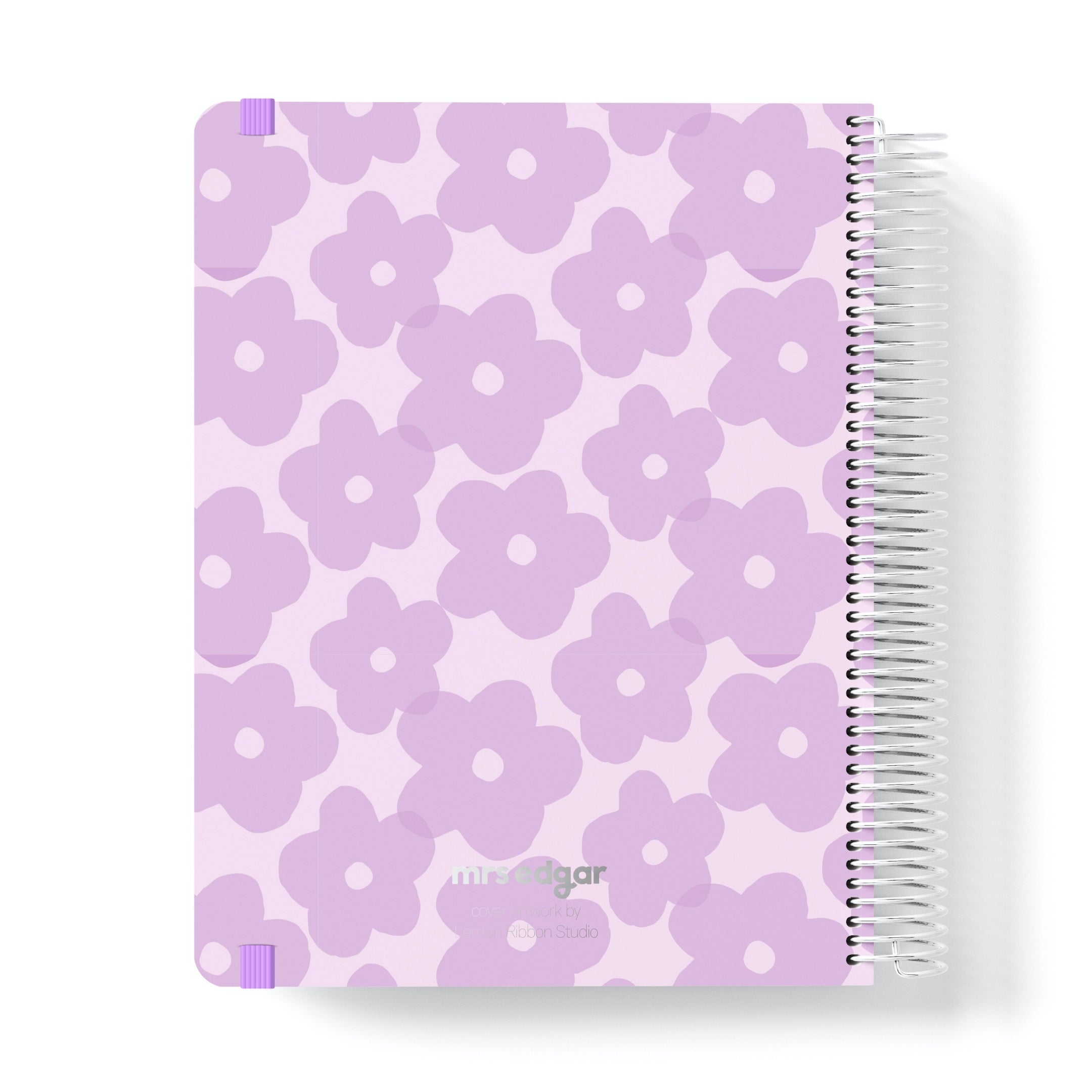 2026 Teacher Planner with lilac floral pattern on a white background with 'mrs edgar' silver foiled text.