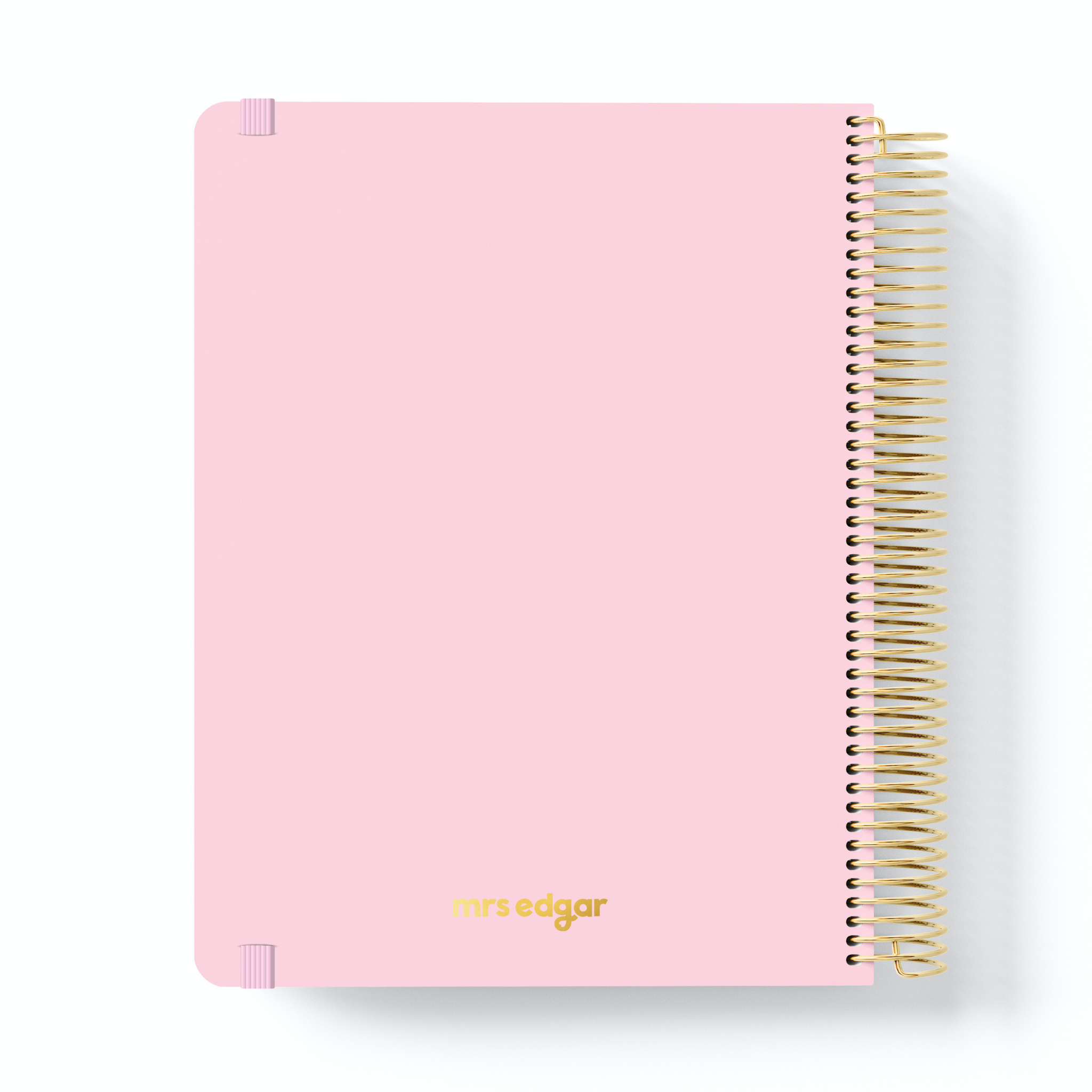 Minimalist pink 2026 planner with gold coil binding and “mrs edgar” text in gold at the bottom centre