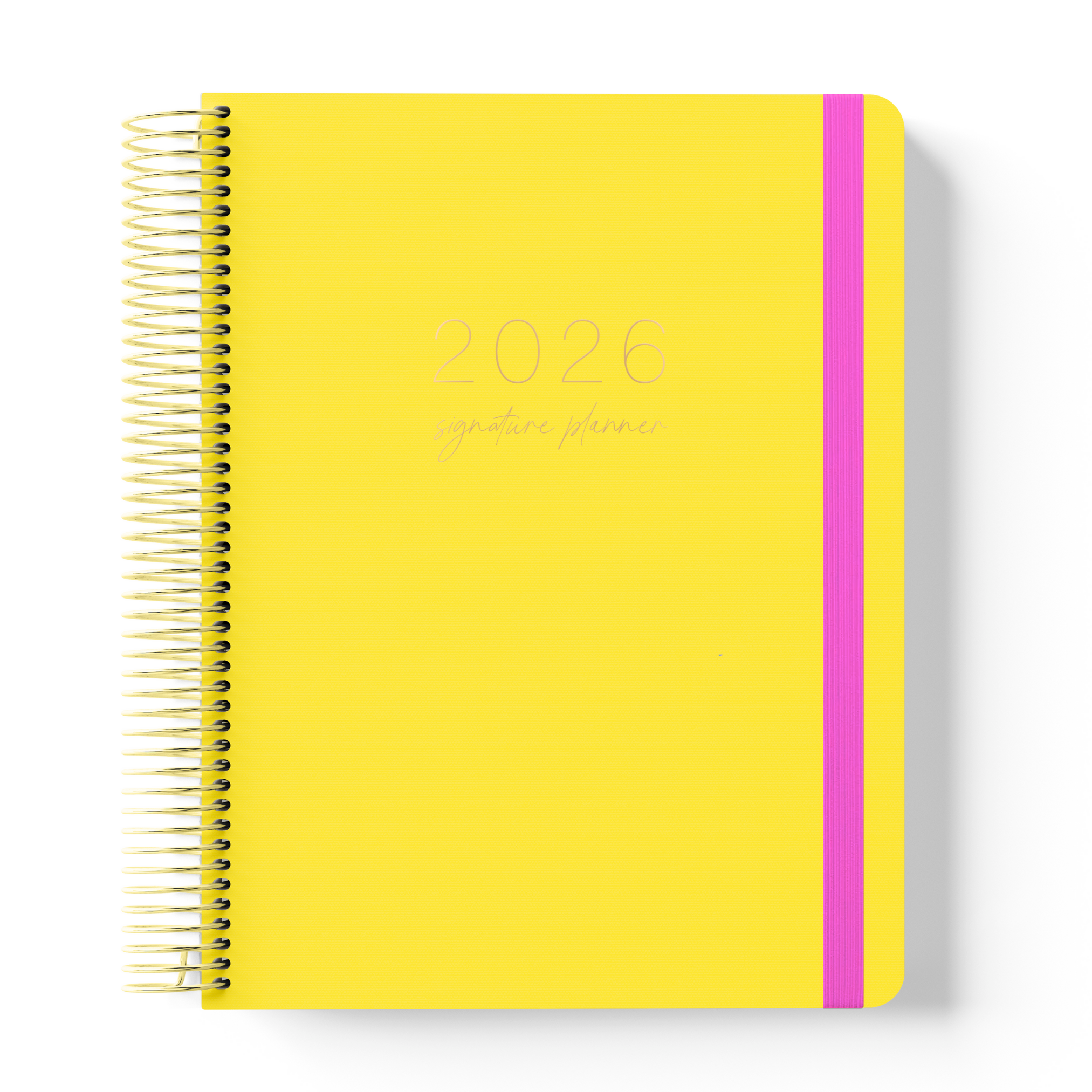 2026 teacher planner with a bold marigold yellow cover, subtle white script text, gold coil binding, and bright pink elastic strap.
