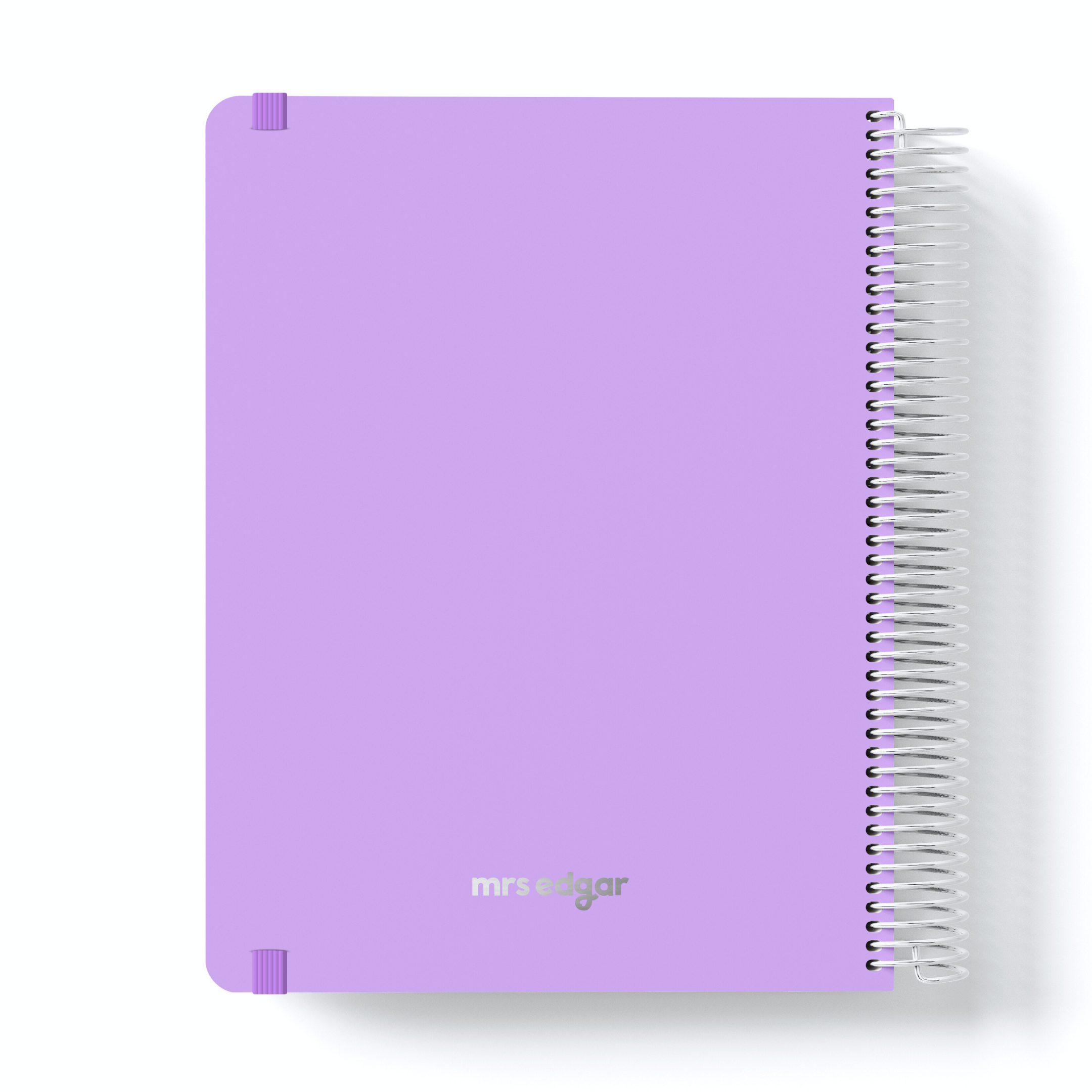 Lavender teacher planner with silver “mrs edgar” logo, spiral binding on the right and corner protectors.