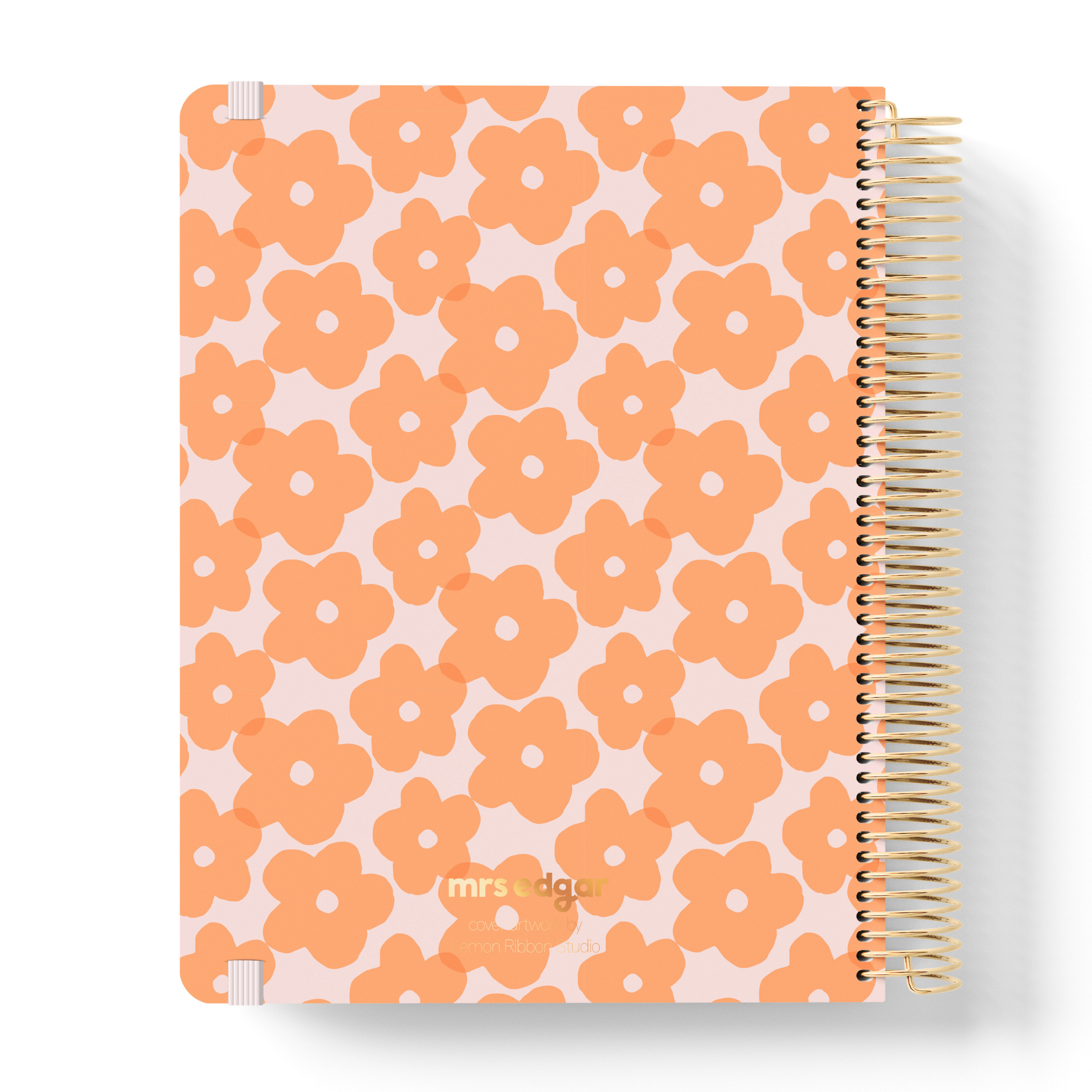 Back cover of a peach planner with tangerine floral print, gold spiral binding, and subtle “mrs edgar” logo.