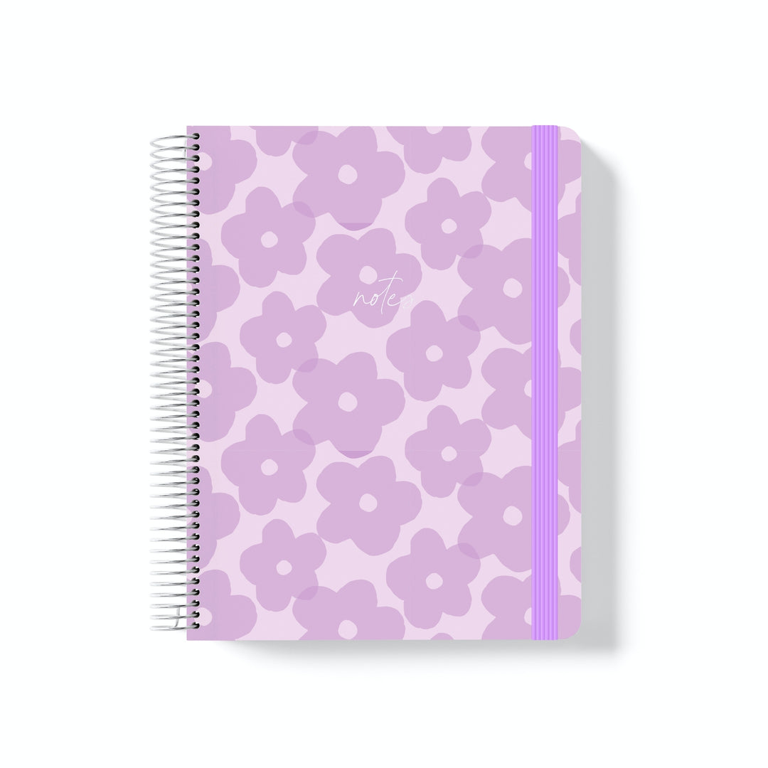 Coiled notebook with lilac floral pattern, purple elastic band, and white “notes” text centred on the front cover.