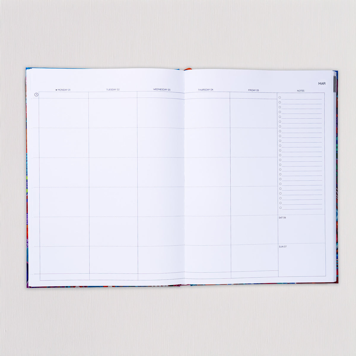 Open 2027 Classic Slimline Teacher Planner showing the weekly spread with Monday to Friday lesson columns, a notes checklist and weekend section