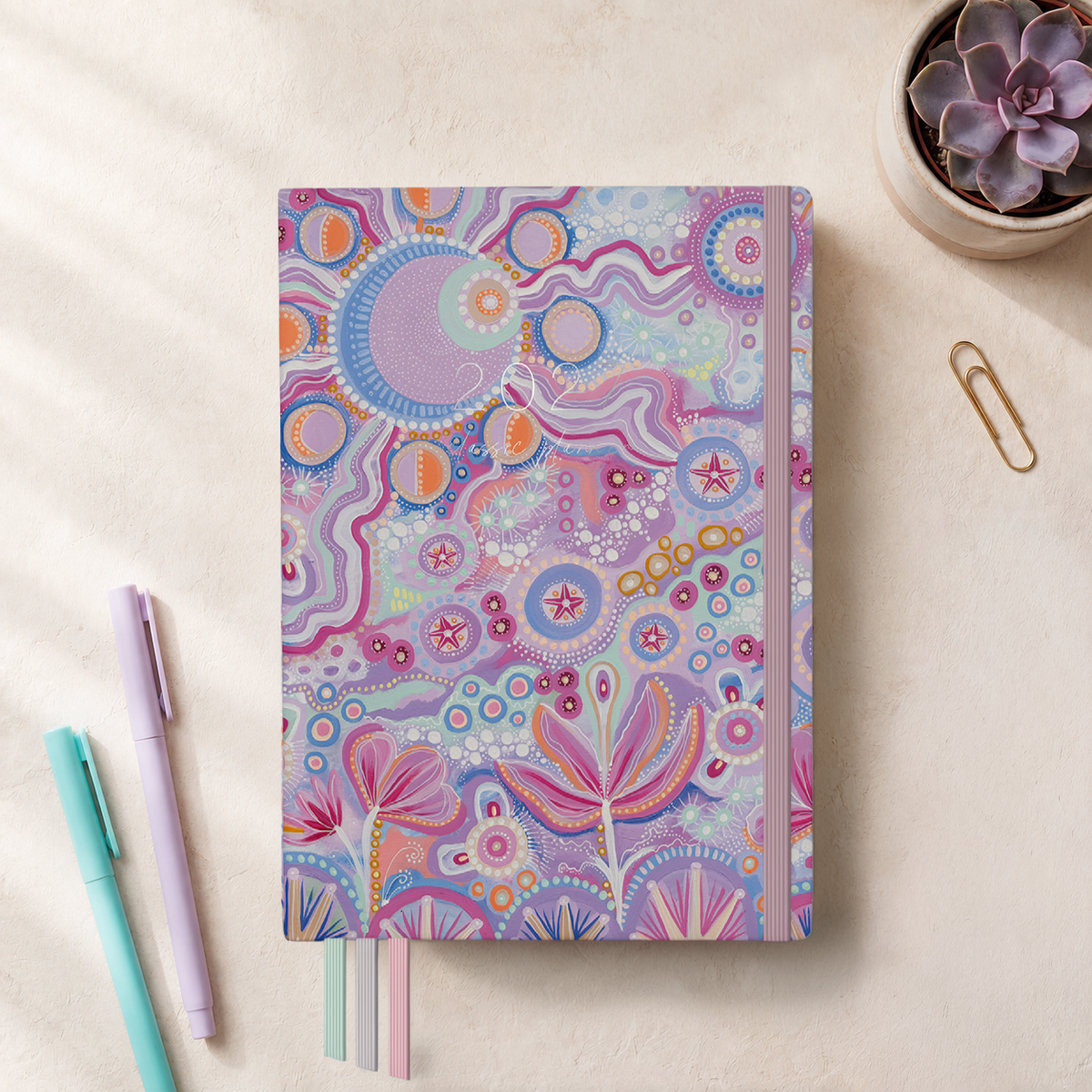 2027 Walking with the Stars Classic Weekly Teacher Planner flatlay showing pastel purple star and floral cover art