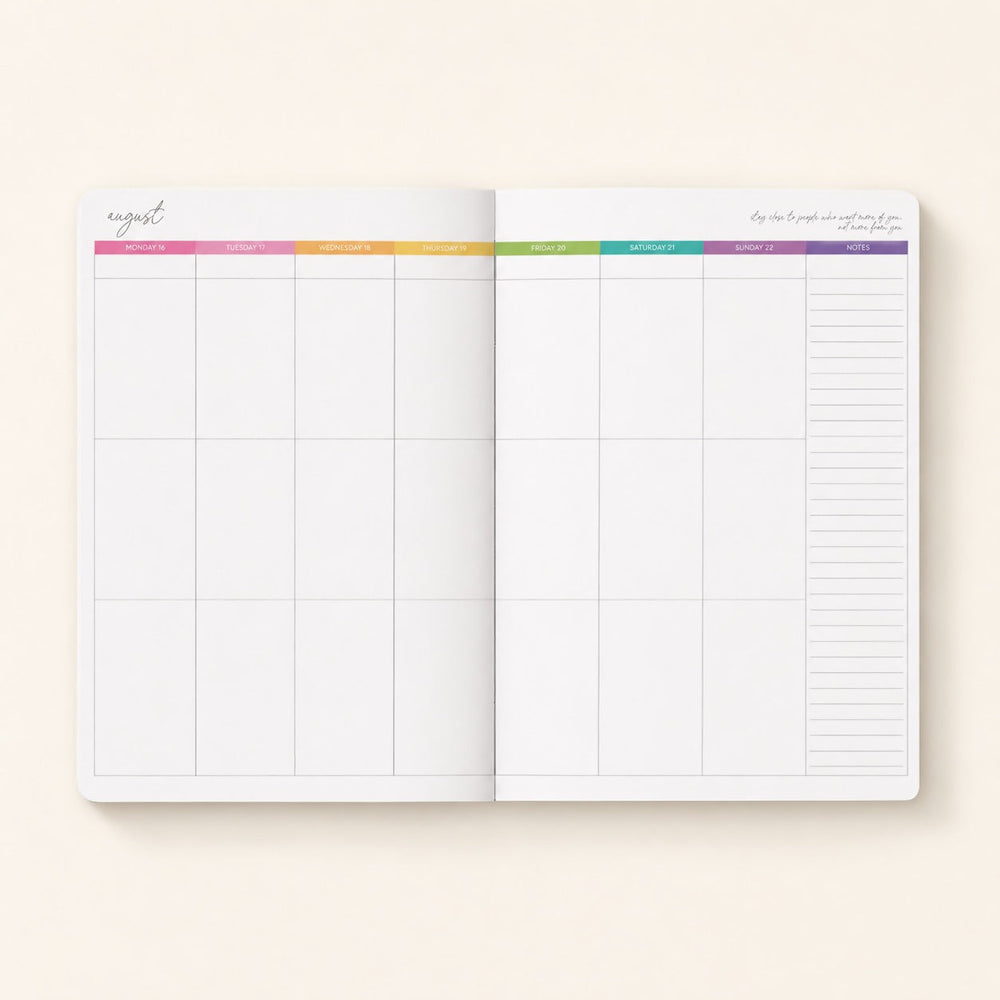 Open 2027 Everyday Planner showing the full week-to-an-opening spread, Monday to Sunday with rainbow day headers and a notes column