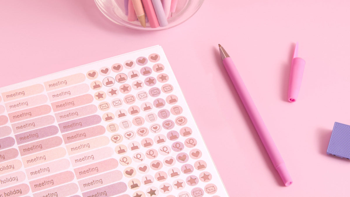 2027 Classic Weekly Teacher Planner neutral sticker sheets in soft blush and mauve with meeting, public holiday and rose-gold foil icon stickers, styled with pink pens