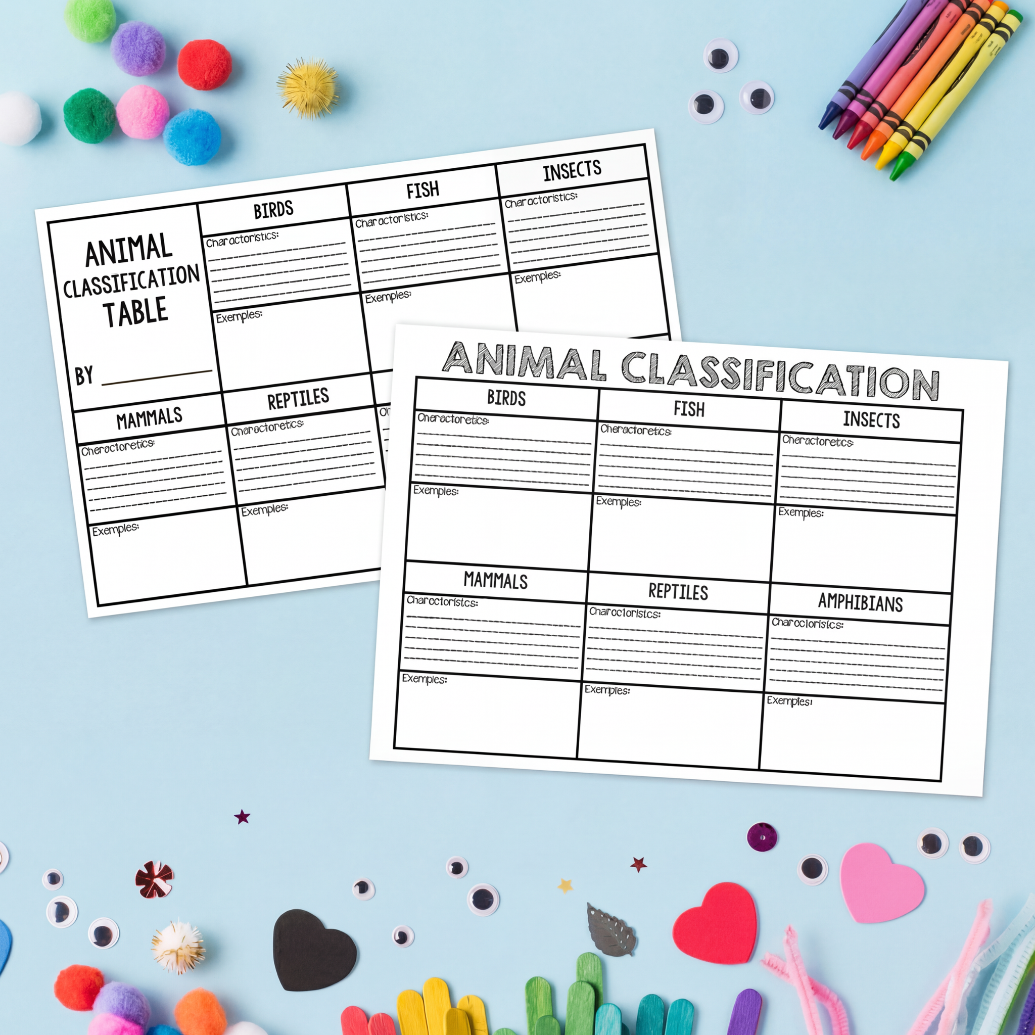 Two animal classification worksheets, one with a 'By:' section and another titled 'Animal Classification,' showcasing categories such as birds, fish, insects, mammals, reptiles, and amphibians, surrounded by colourful craft materials like hearts and popsicle sticks.