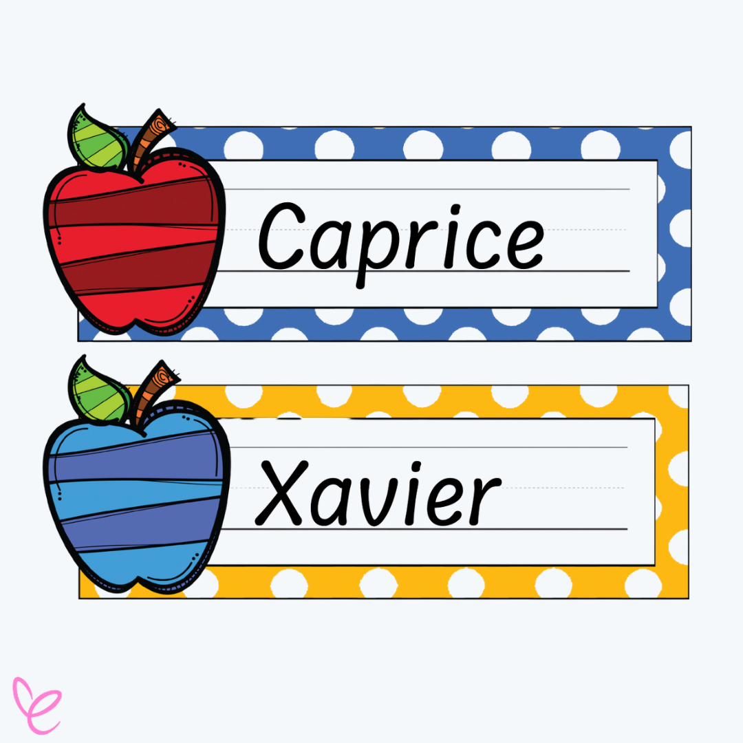 Two classroom nameplates — a blue polka-dot border with a red apple for "Caprice" and a yellow polka-dot border with a blue apple for "Xavier."