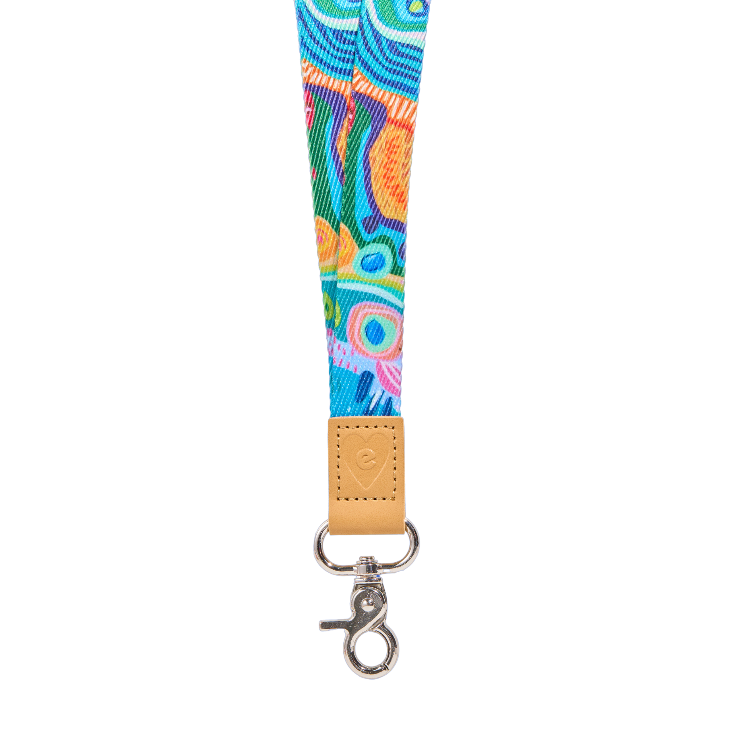 Colourful abstract fabric lanyard with teal, orange and pink pattern, tan leather tab with embossed heart logo, and silver clasp, isolated on a clean white background