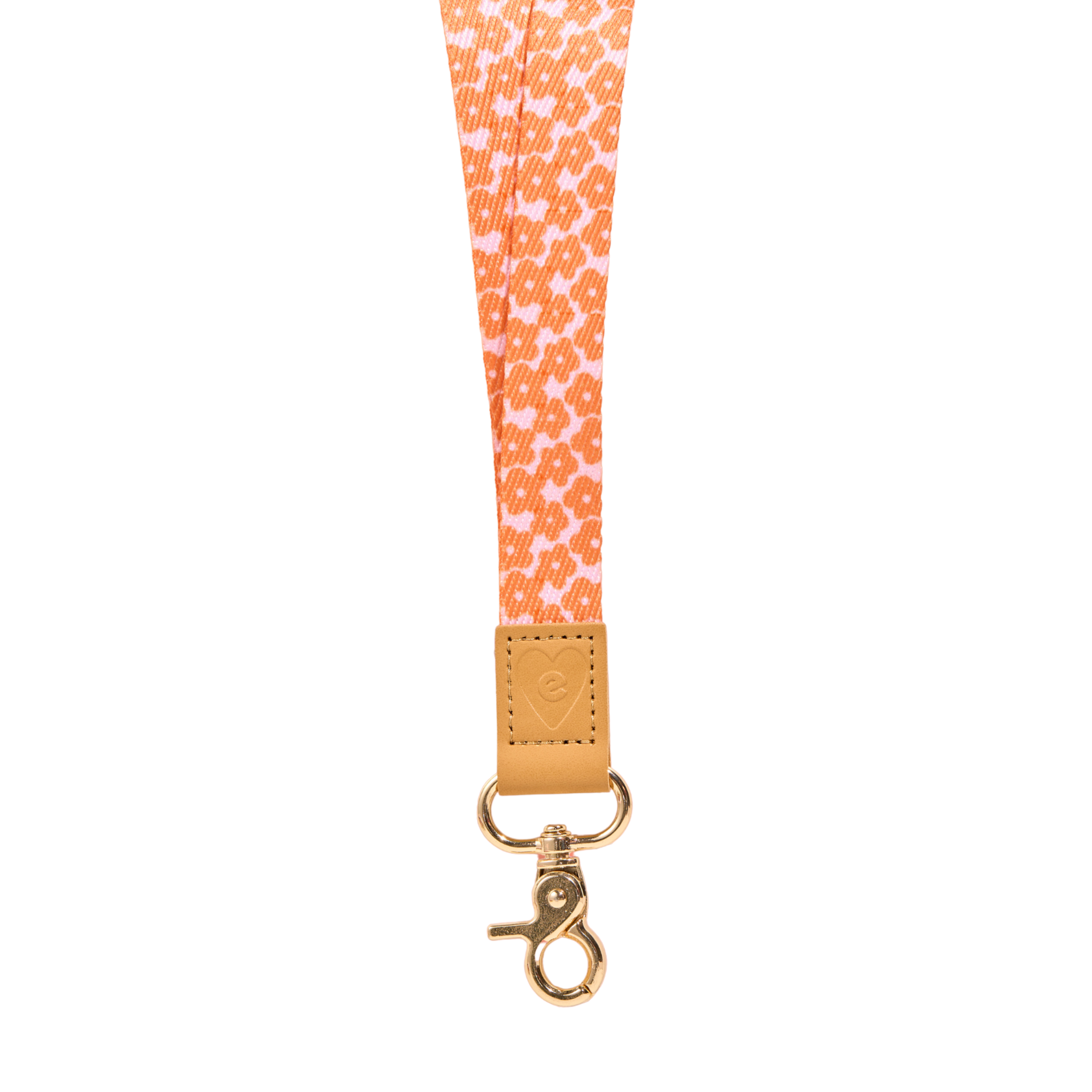 Orange floral fabric lanyard with tan leather tab and gold clasp, featuring embossed heart logo detail, isolated on a clean white background