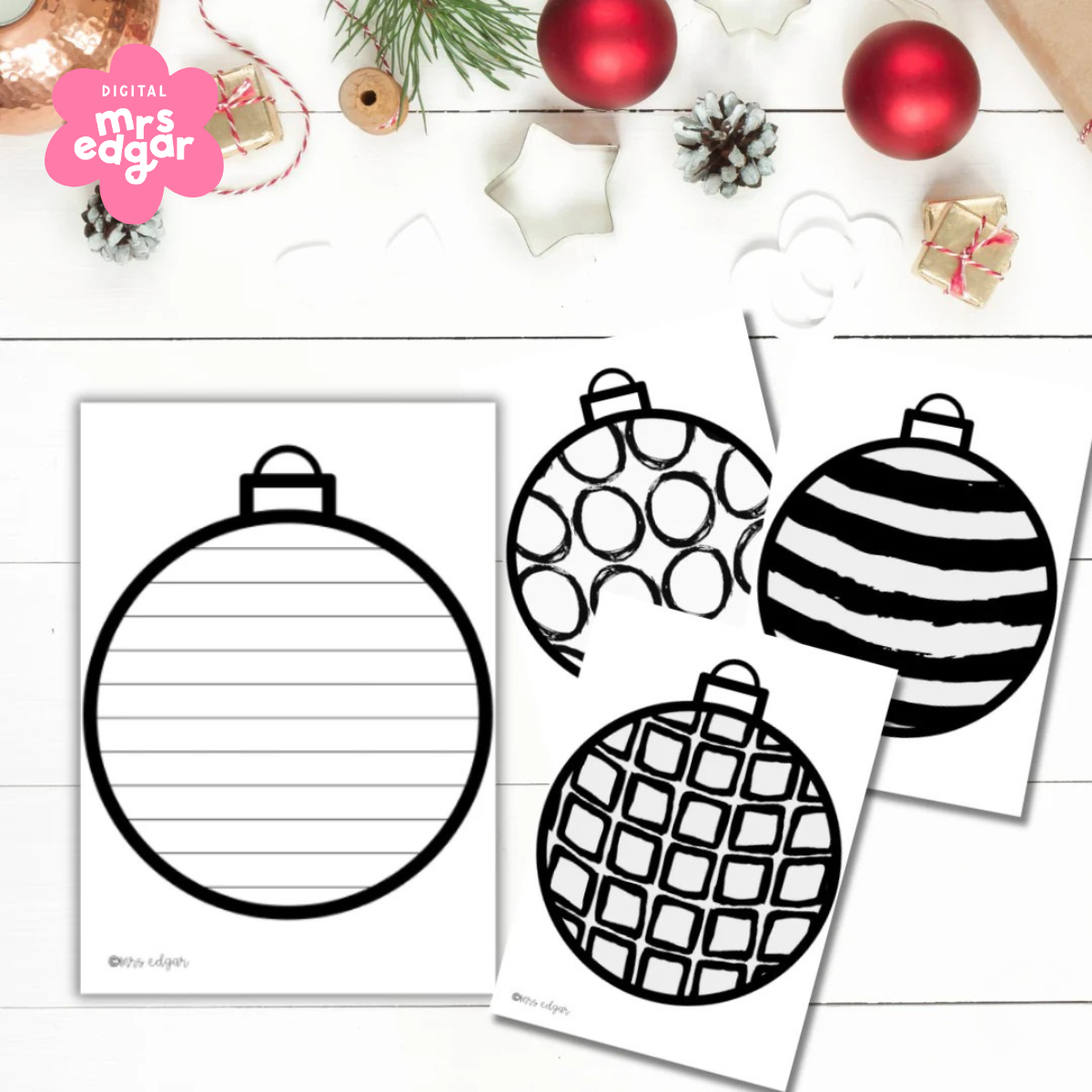 Printable Christmas ornament templates featuring a variety of bold black-and-white patterns and a lined writing version. Set on a festive background with pinecones, baubles, and gift wrap for a holiday-themed classroom activity.