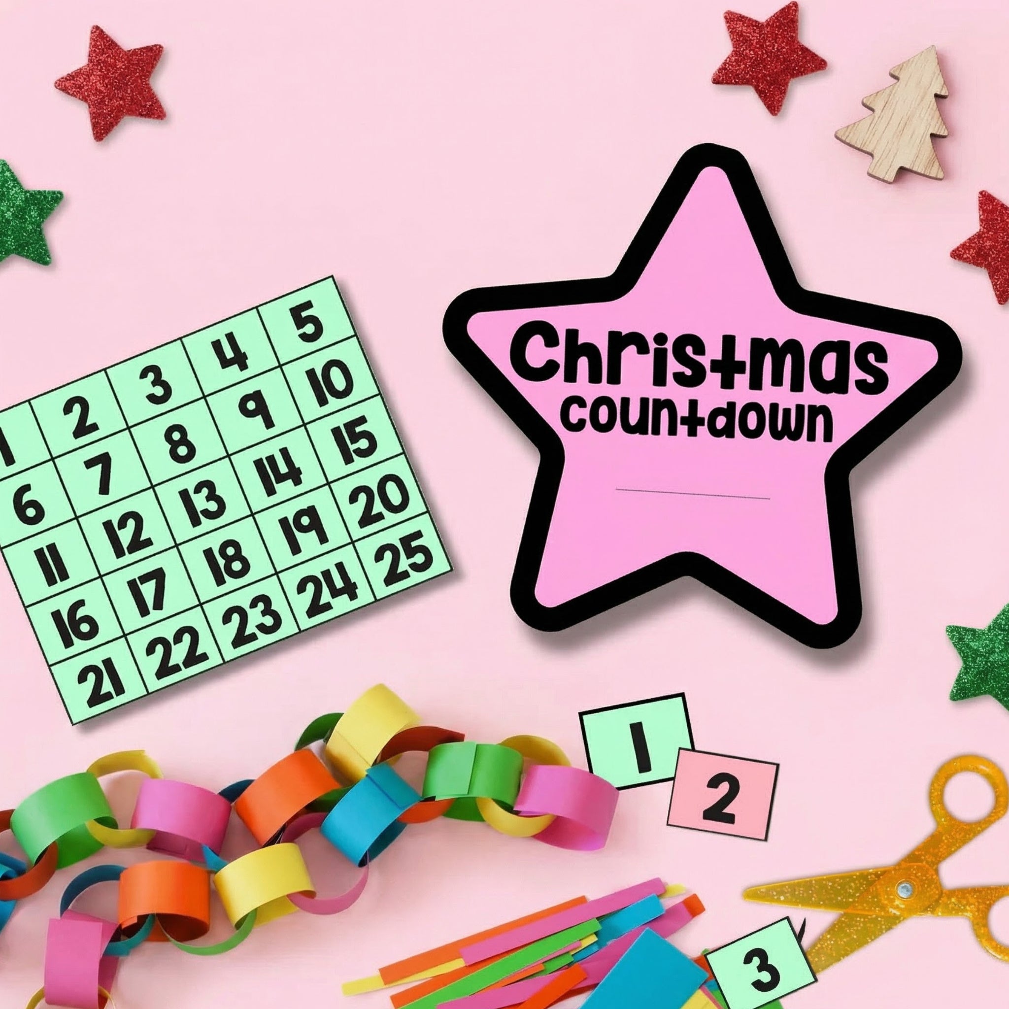 Printable Christmas countdown activity featuring a star-shaped “Christmas Countdown” sign and numbered cards from 1–25. The display is styled with colourful paper chains, scissors, and craft supplies on a pink background.