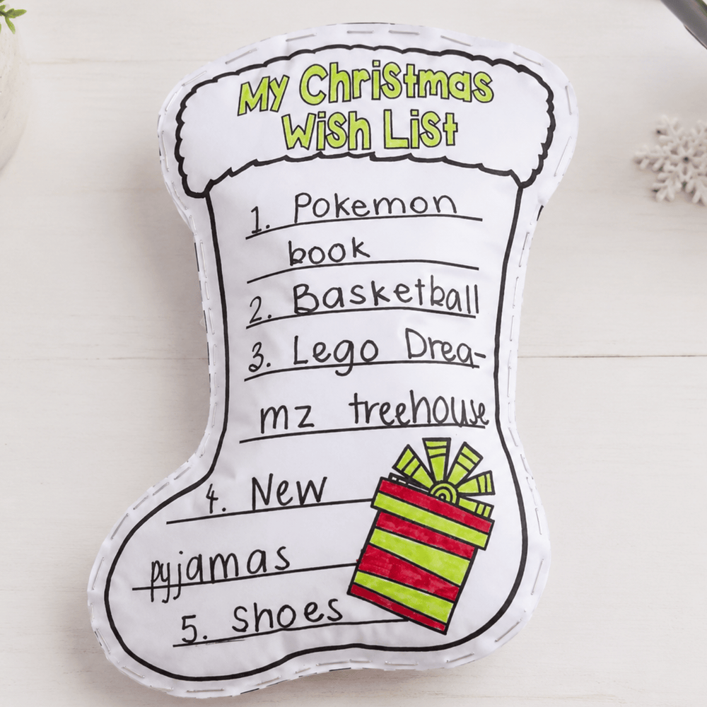 My Christmas Wish List' stocking craft with handwritten items: Pokemon book, Basketball, Lego Dreamhouse, New pyjamas, Shoes
