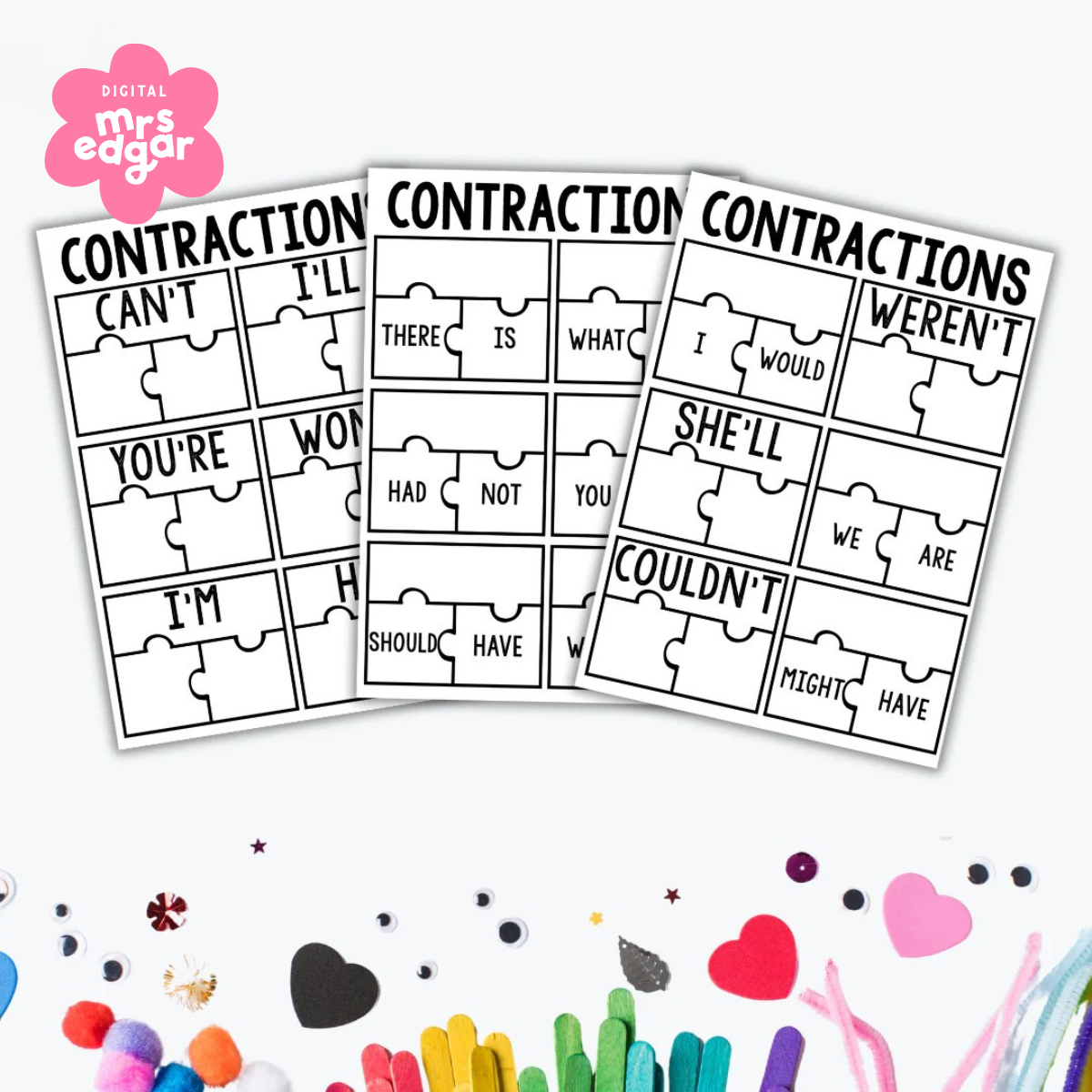 Three printable contraction puzzles fanned out, displaying words like 'you're,' 'there is,' and 'weren’t.' The background includes craft materials like popsicle sticks, hearts, and googly eyes.