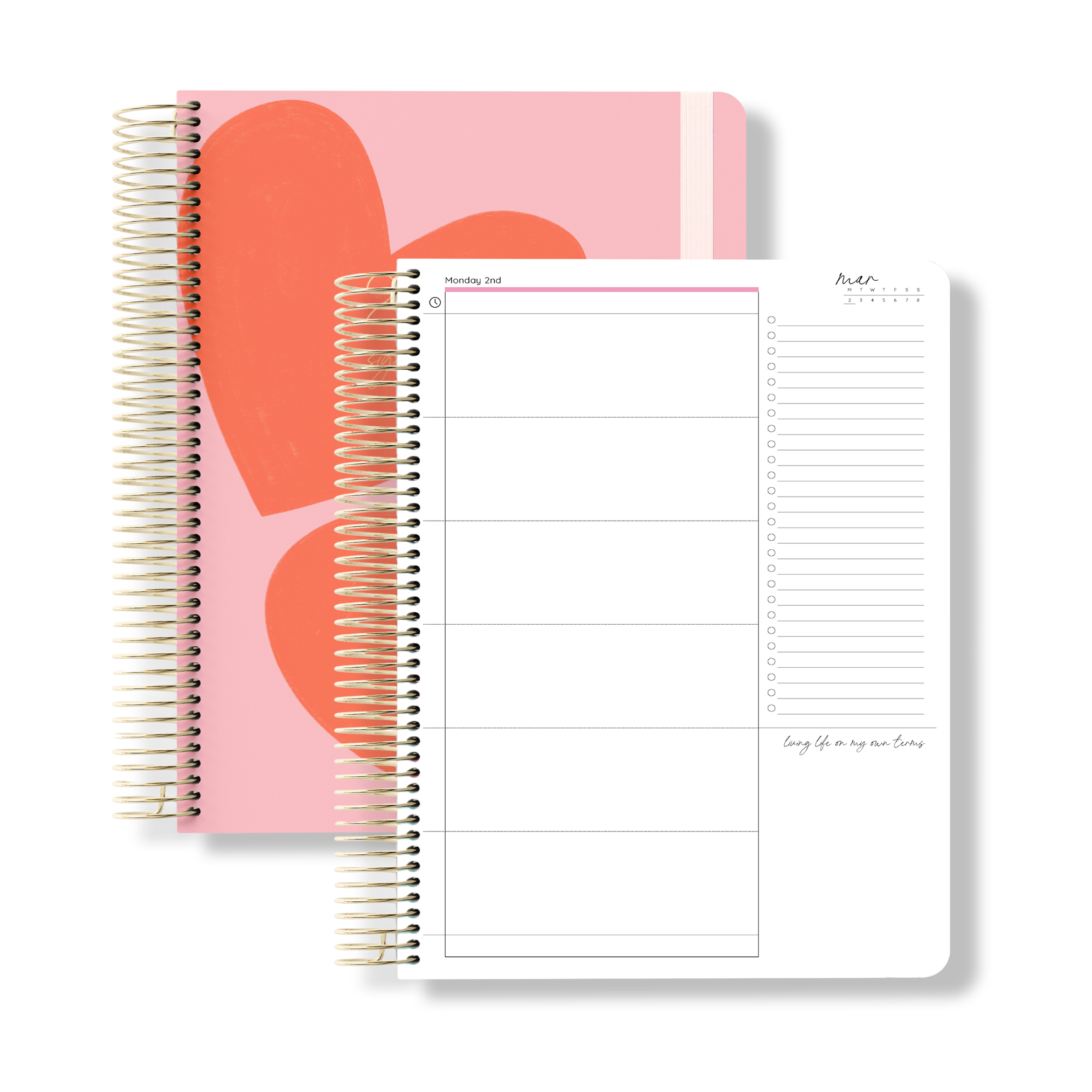 Flat lay of the 2026 daily teacher planner with oversized red heart shapes on a pink cover, shown beside an open daily layout.