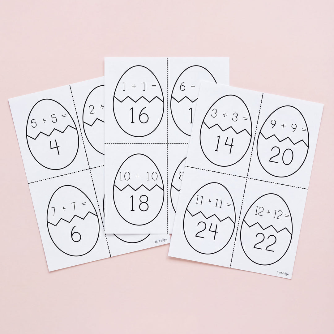 Set of Easter egg-shaped math problem cards on a pink background