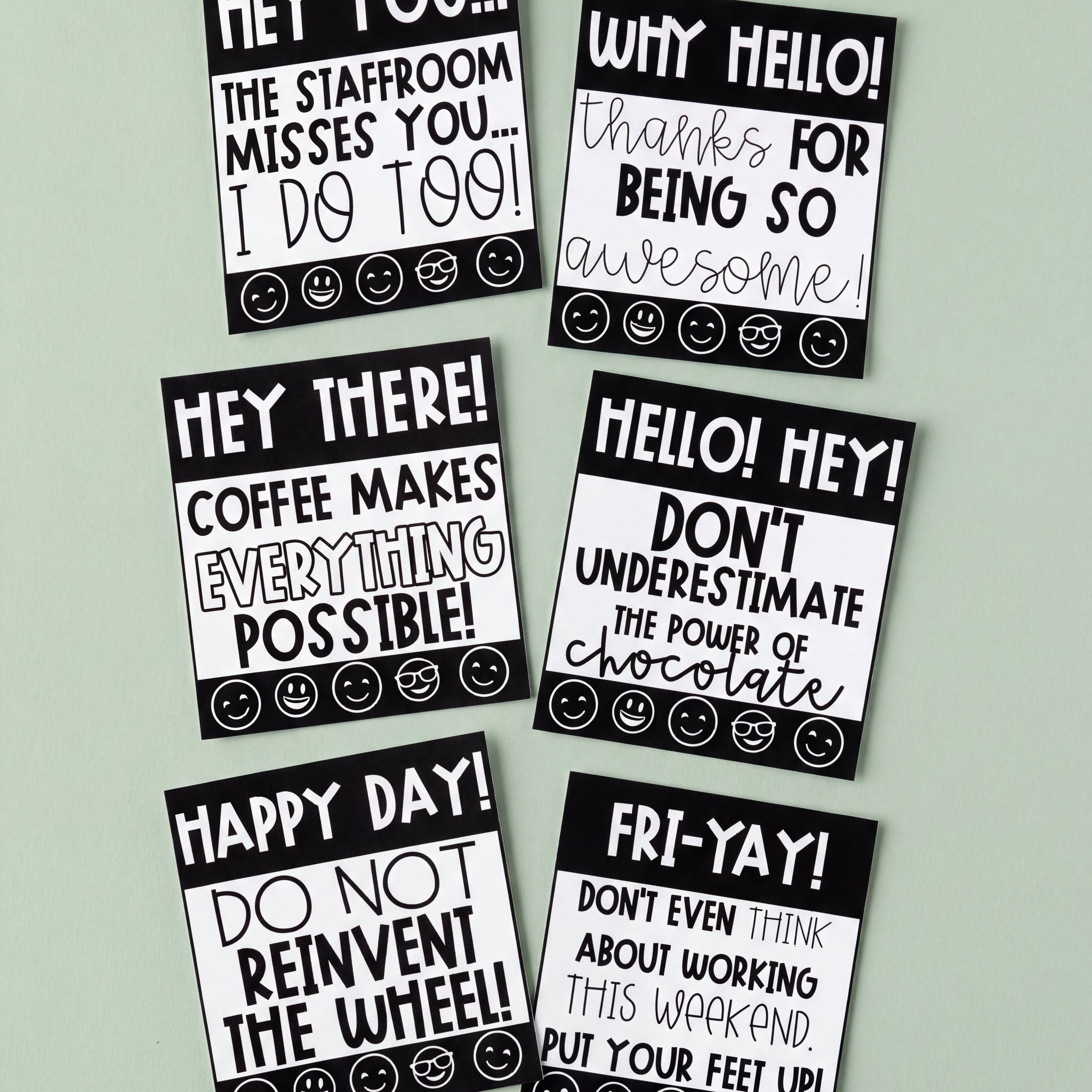 Two Teacher Wellbeing Notes cards for World Teachers' Day on a desk with paperclips, designed to brighten someone’s day.