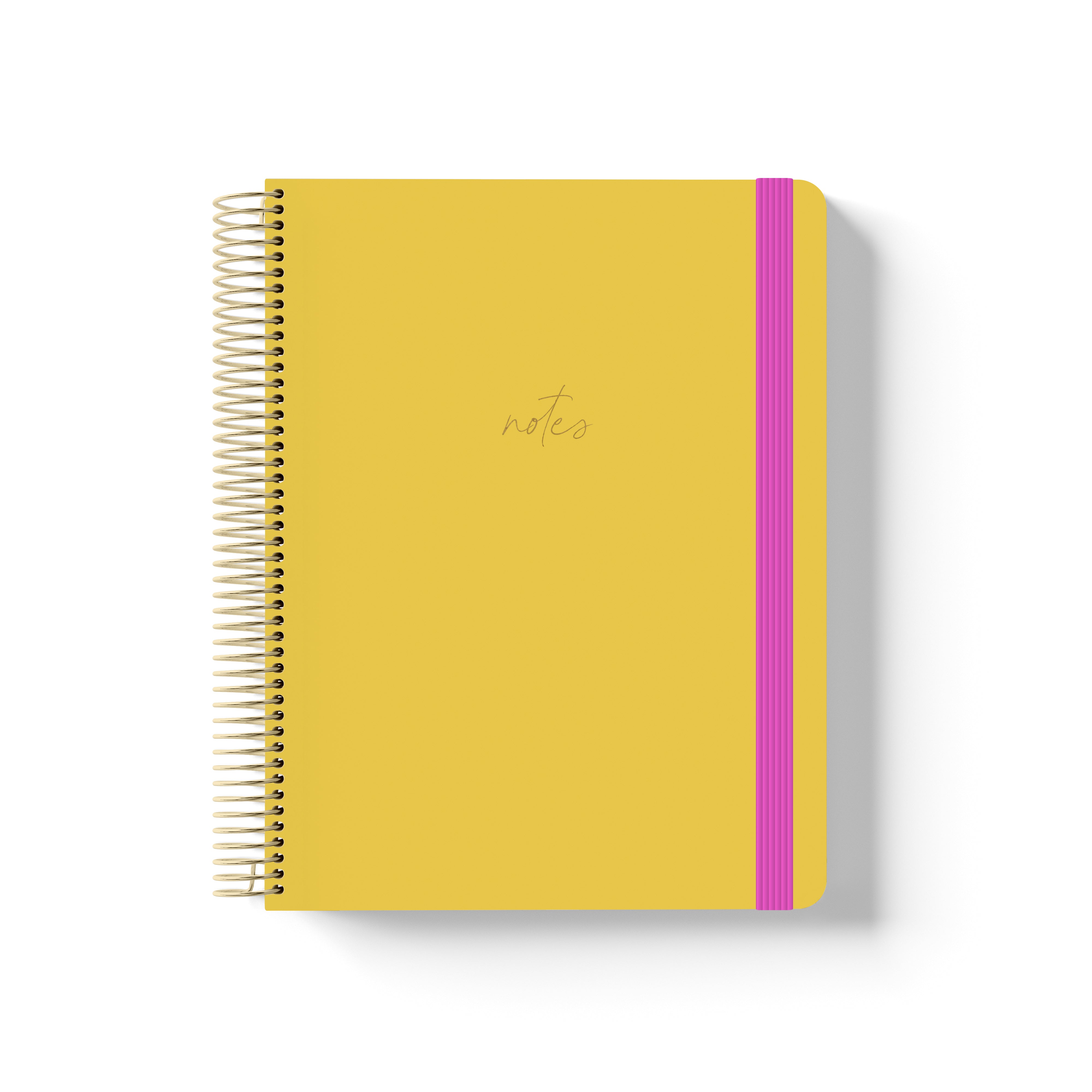 Marigold yellow coiled notebook with gold spiral binding, hot pink elastic band, and minimalist “notes” text in gold script.