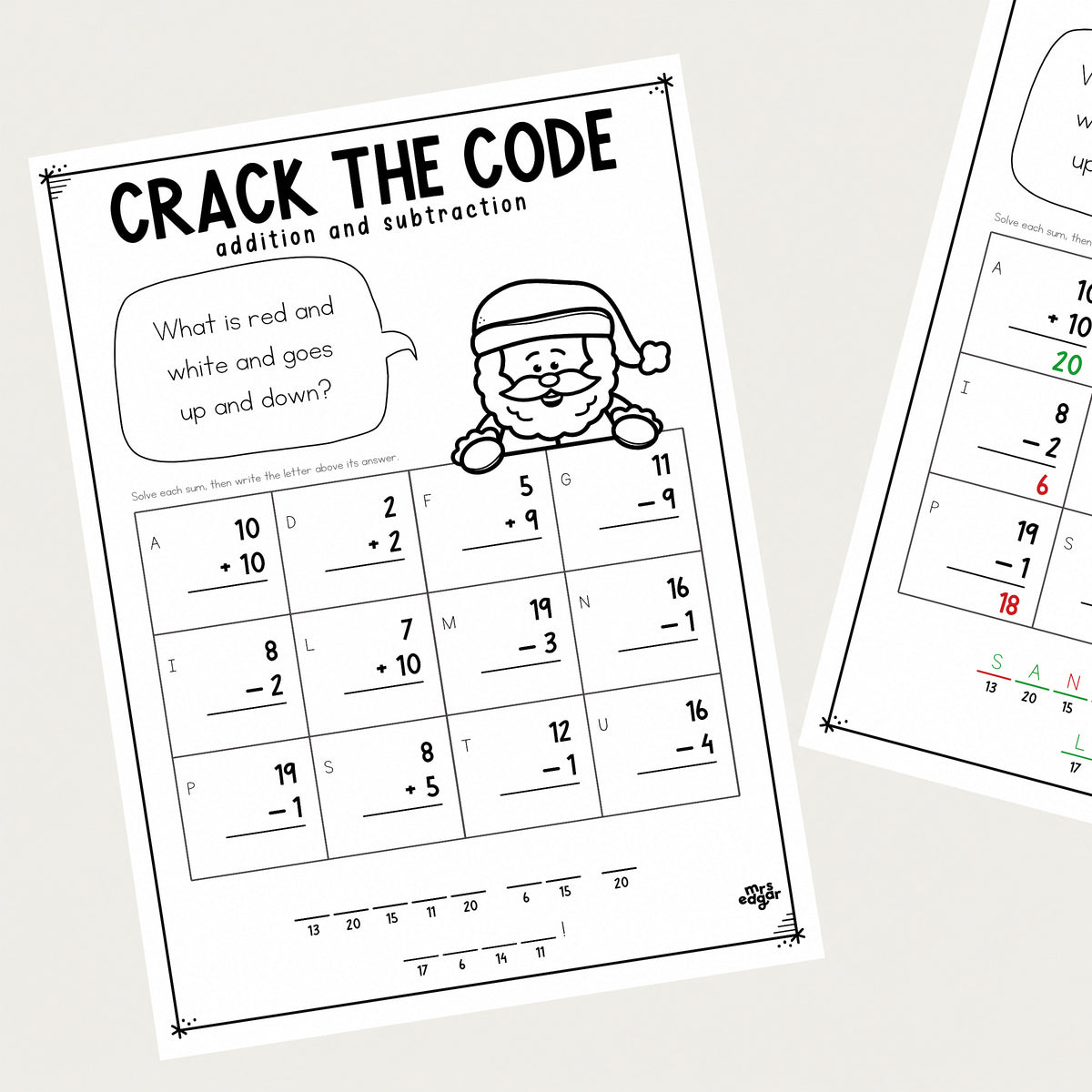A Christmas Crack the Code Year 1 worksheet with its answer key behind