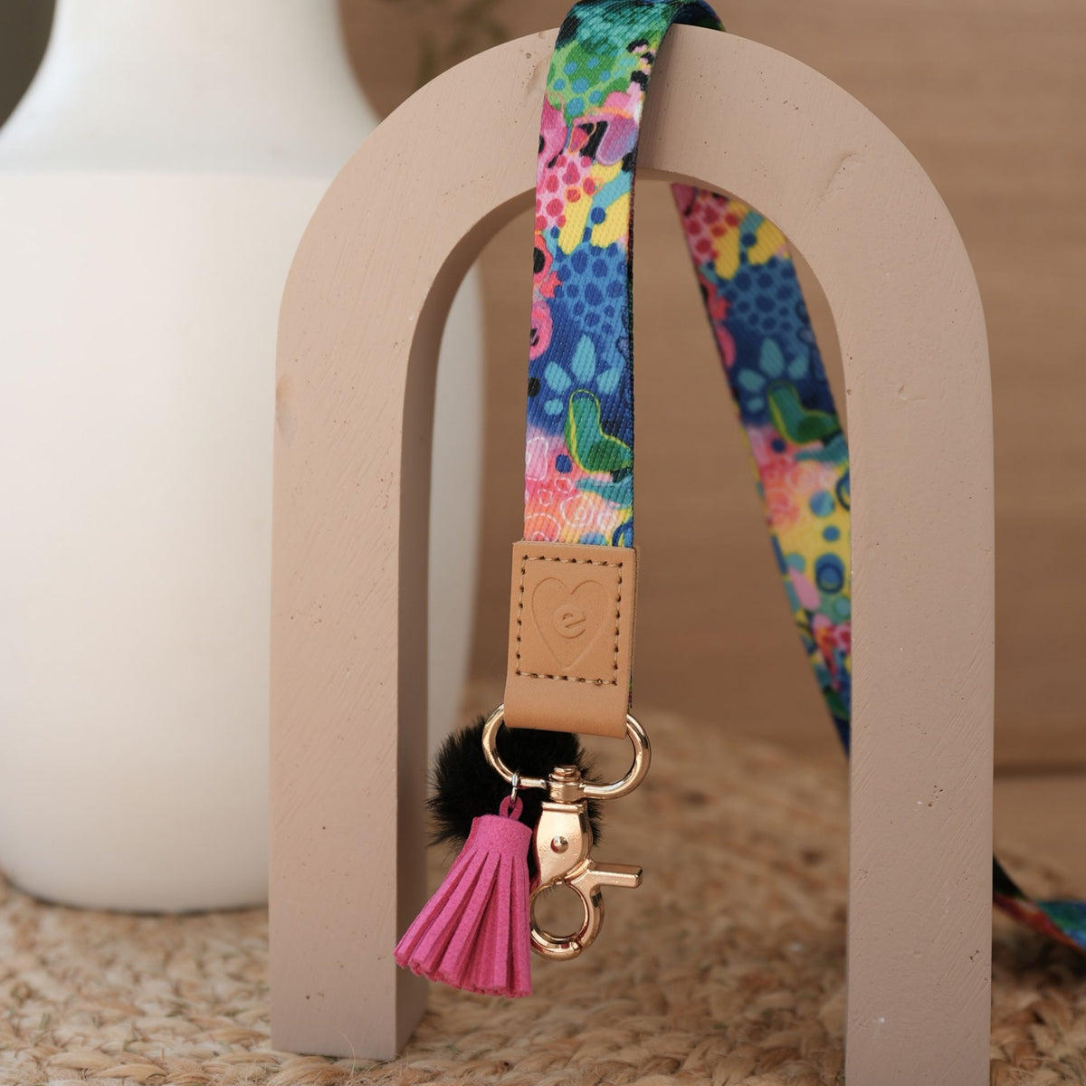 Boom teacher lanyard by Kasey Rainbow full length, gold breakaway clasp, black pom pom and hot pink tassel