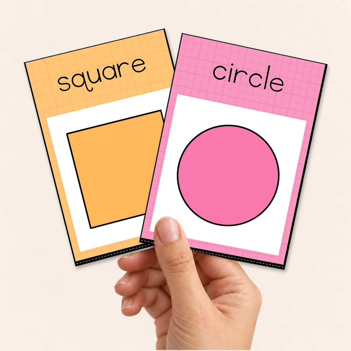 Two 2D shape flashcards held in hand, Bright colours