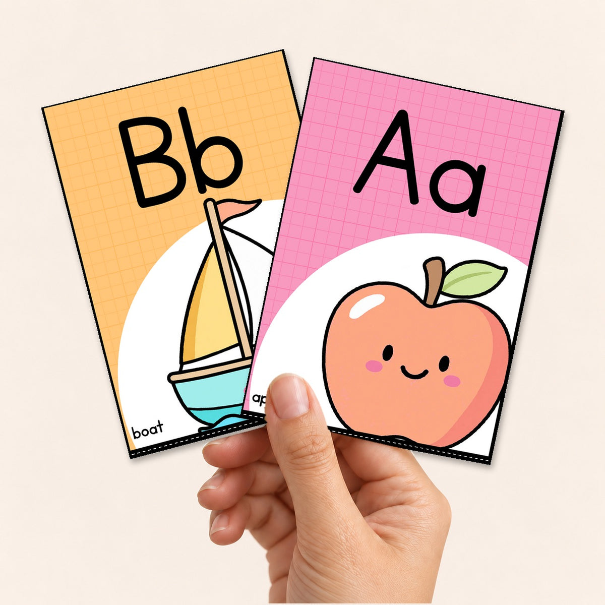 Alphabet flashcards held in hand, Bright colours