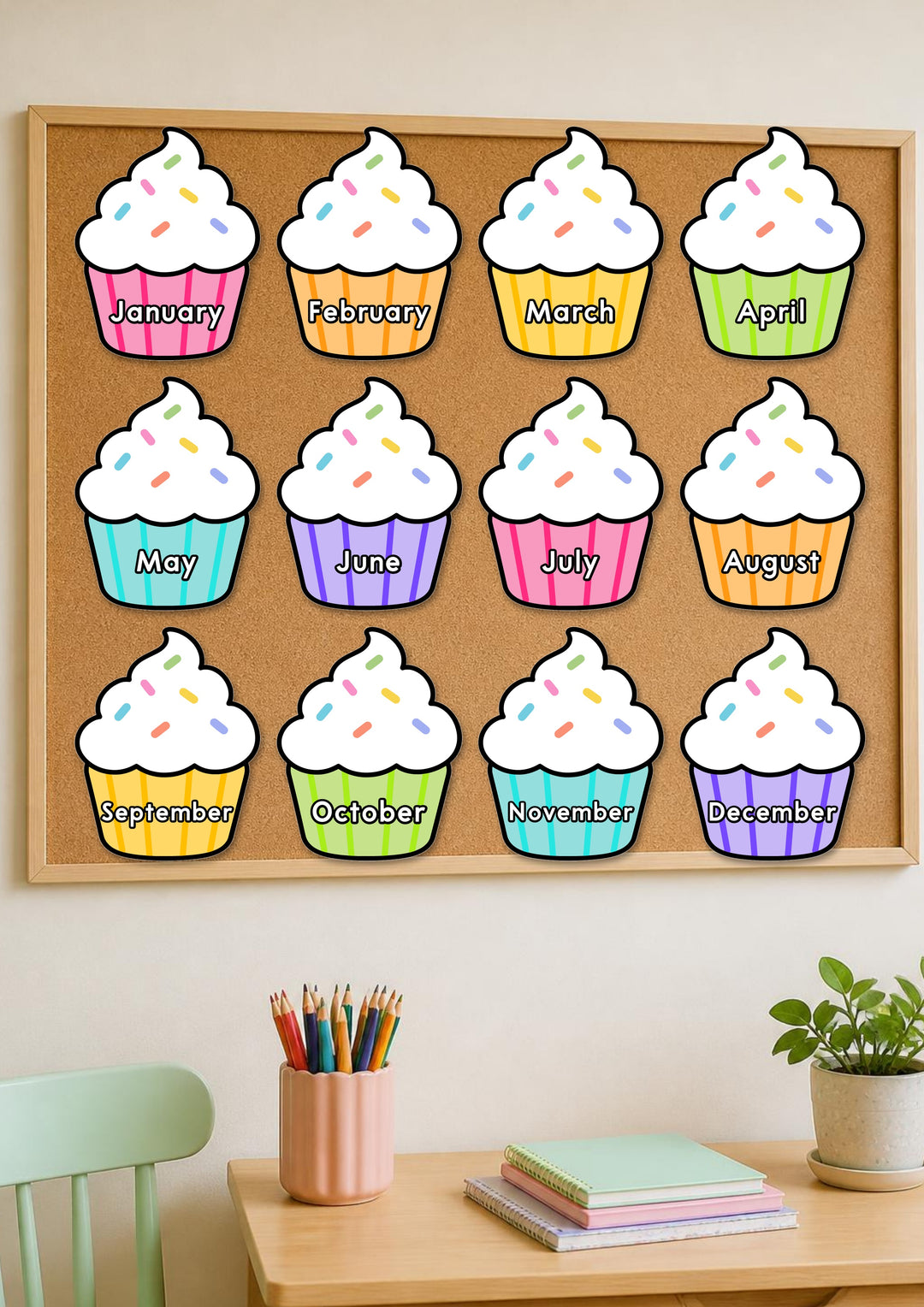 Birthday cupcakes pinned on a classroom pinboard, Bright colours