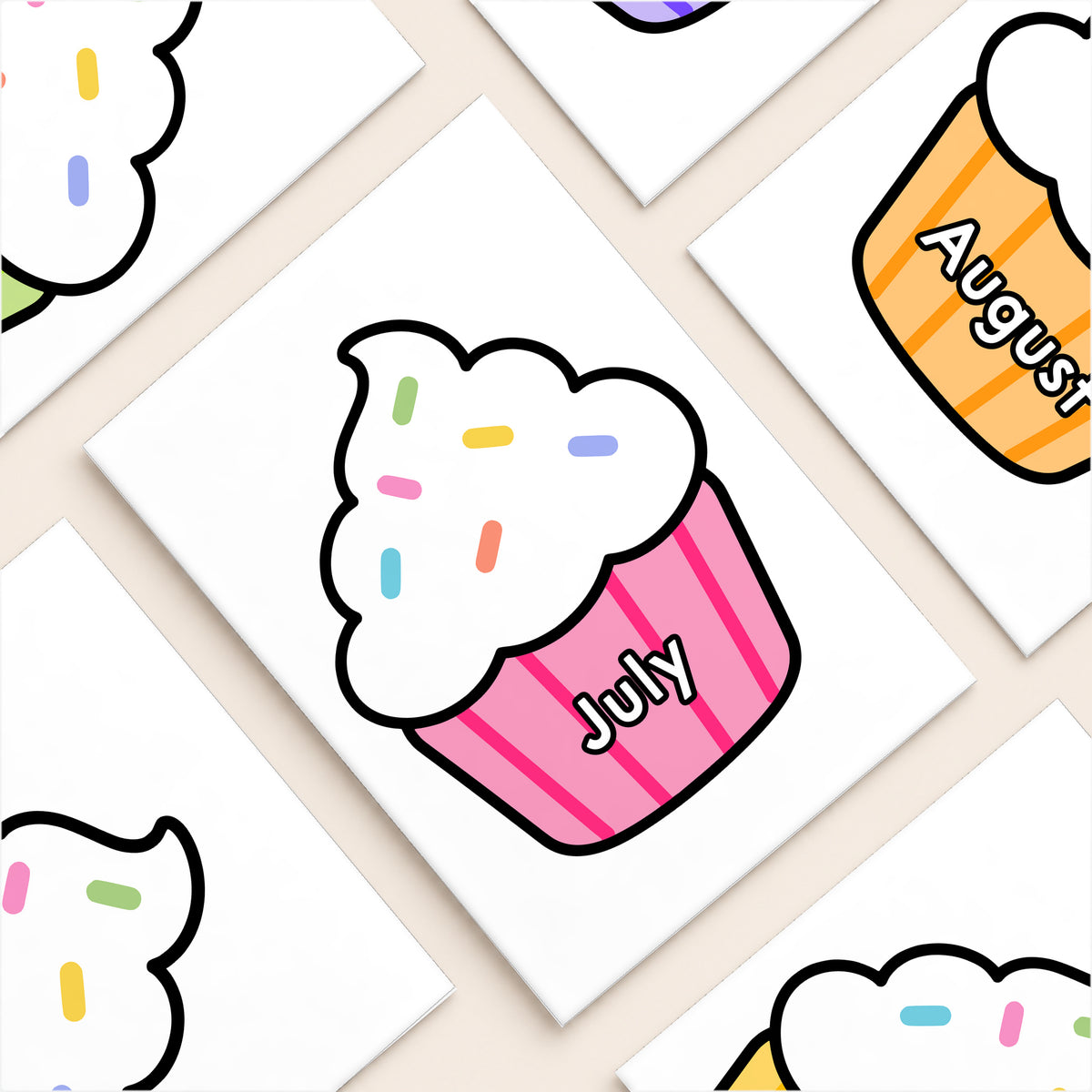 Flat lay of birthday cupcake cut-outs, Bright colours