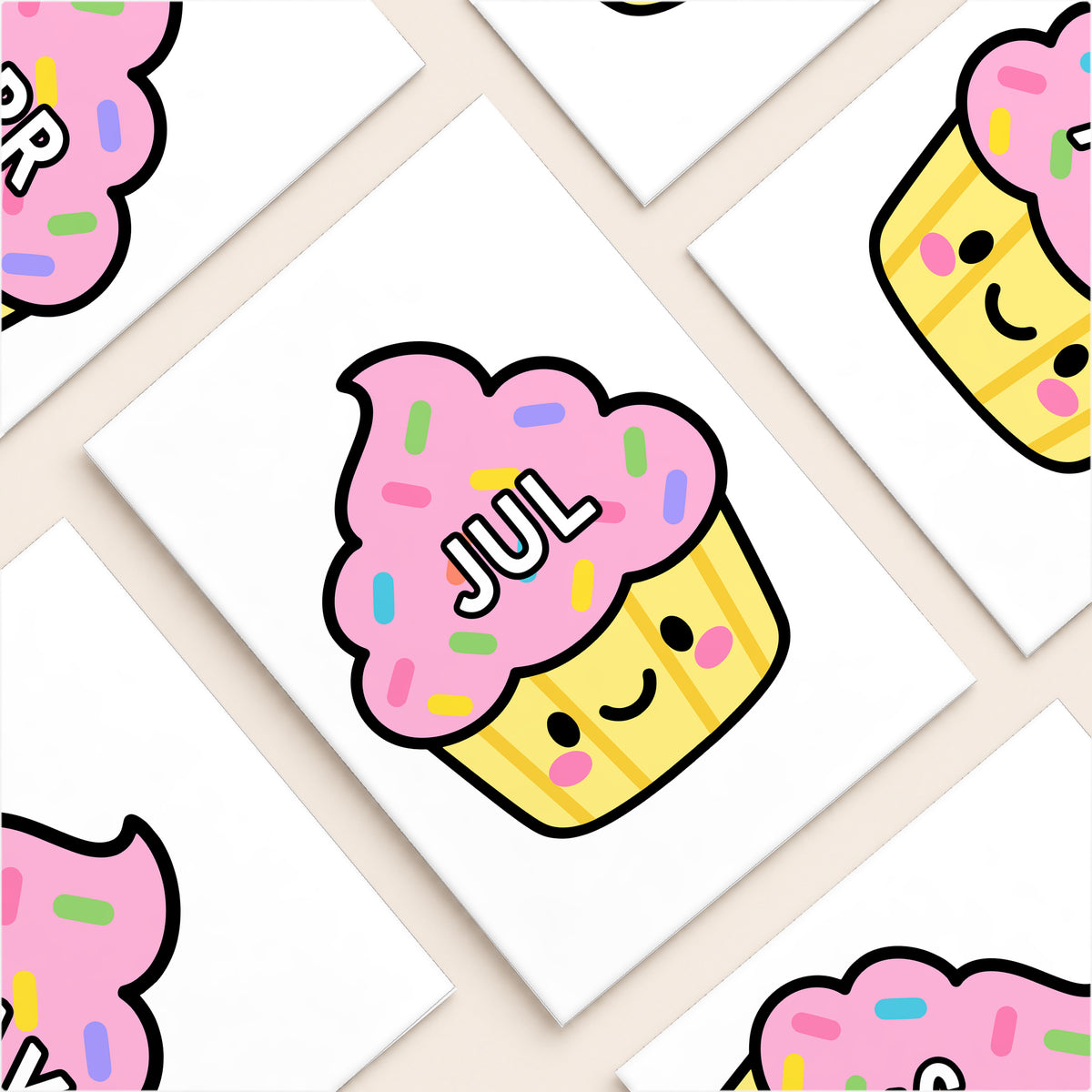 Flat lay of pink birthday cupcake cut-outs, Bright colours