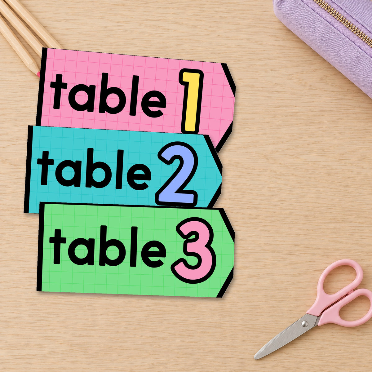 Bright table number tags on student desks