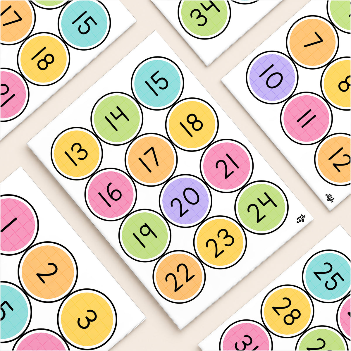 Flat lay of number circle label pages, Bright colours