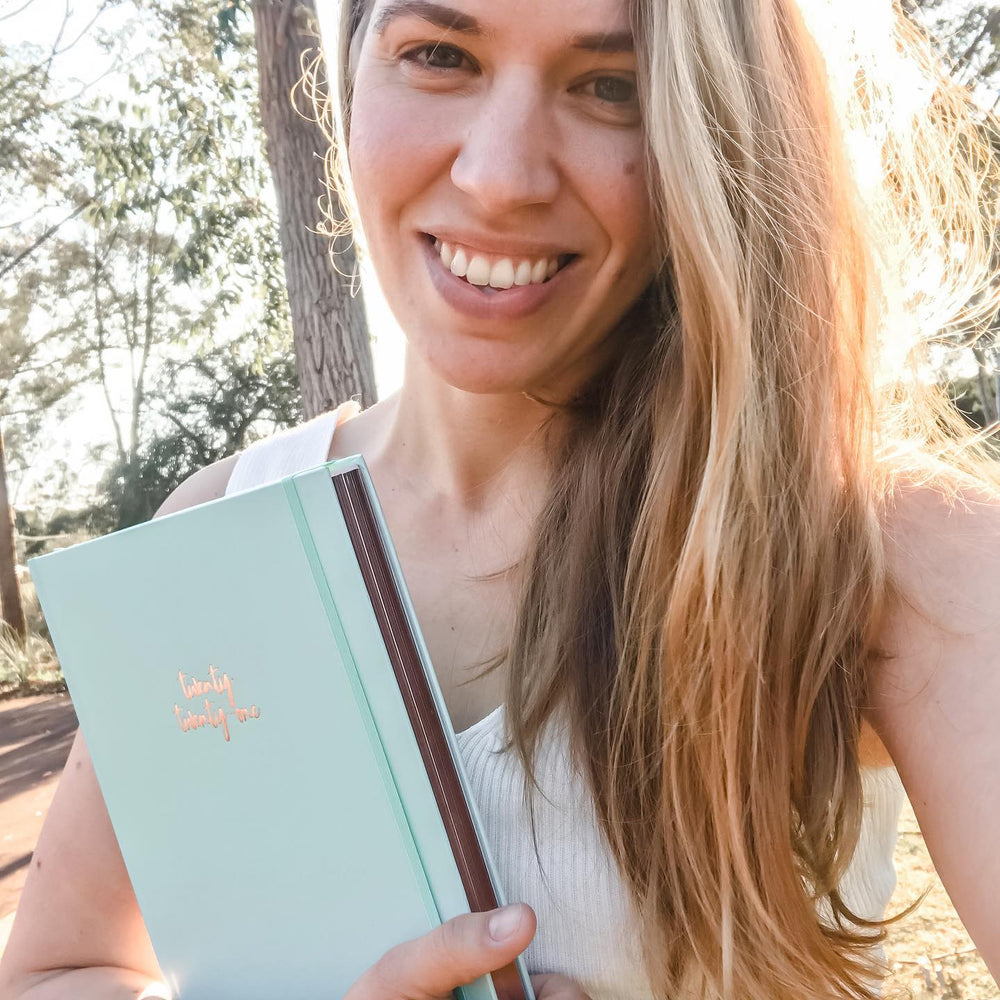 Jo writing in a Mrs Edgar planner