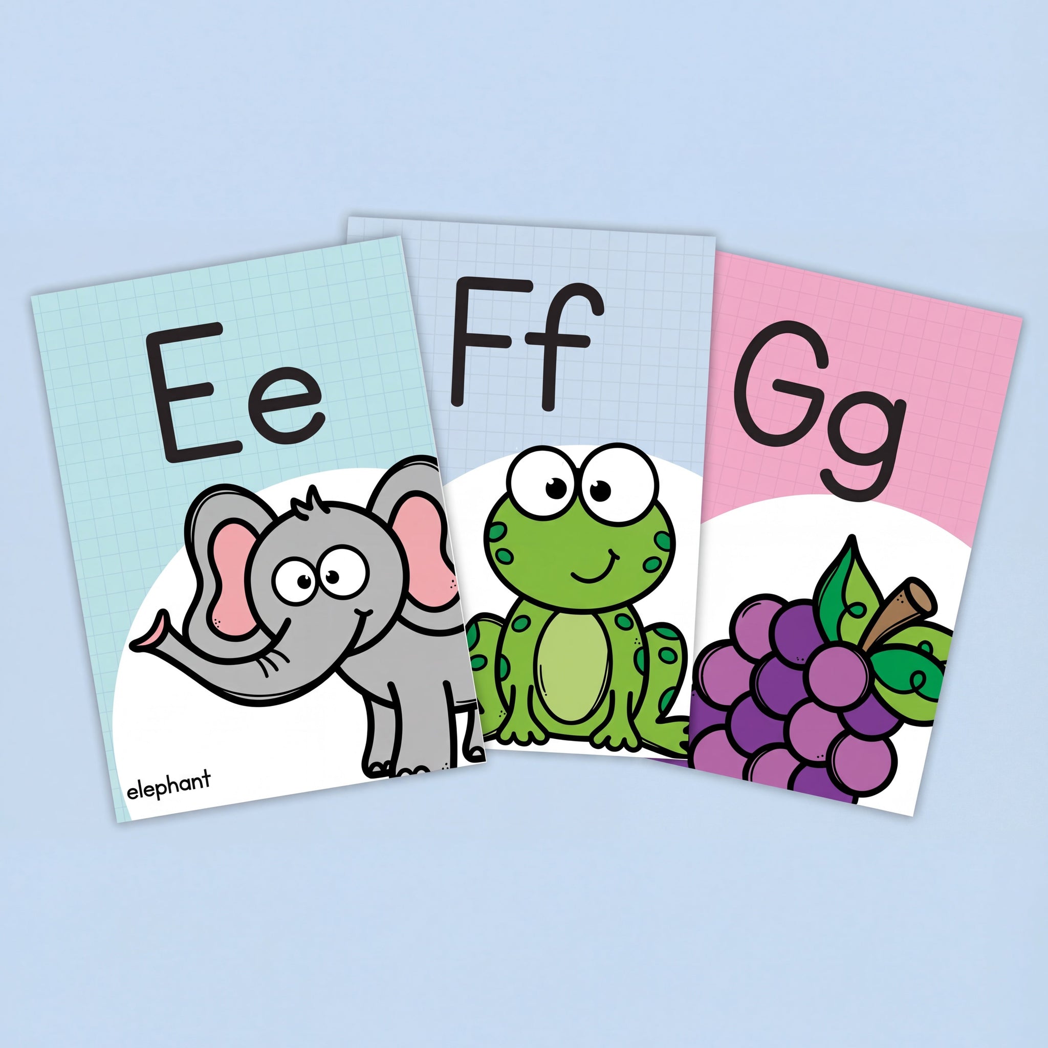 Digital download alphabet posters featuring letters A, B, and C on a white background, surrounded by craft items for a creative learning setup.