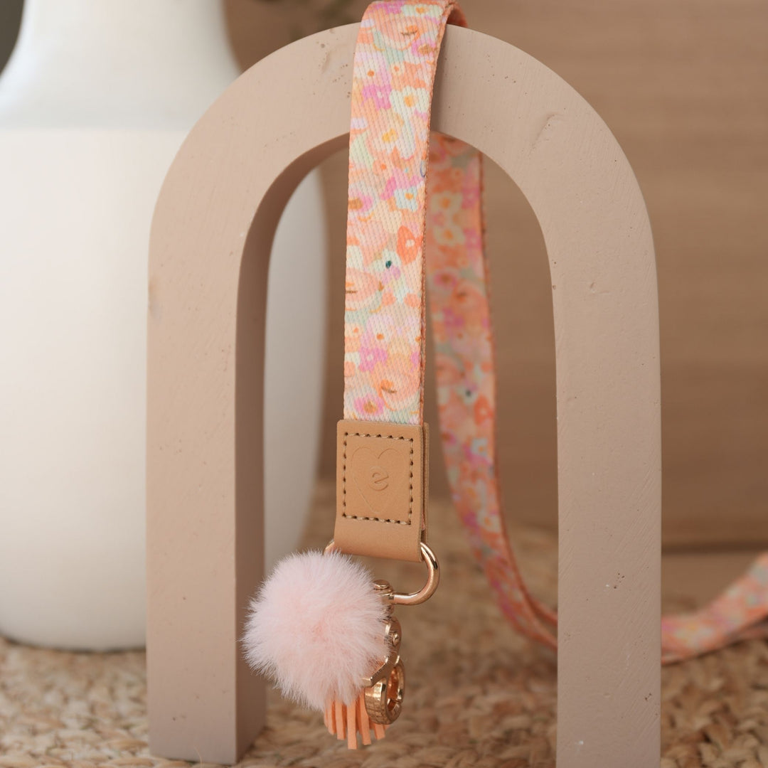 Love Fool floral teacher lanyard by Jade Fisher full length, gold clasp, peach pom pom and orange tassel
