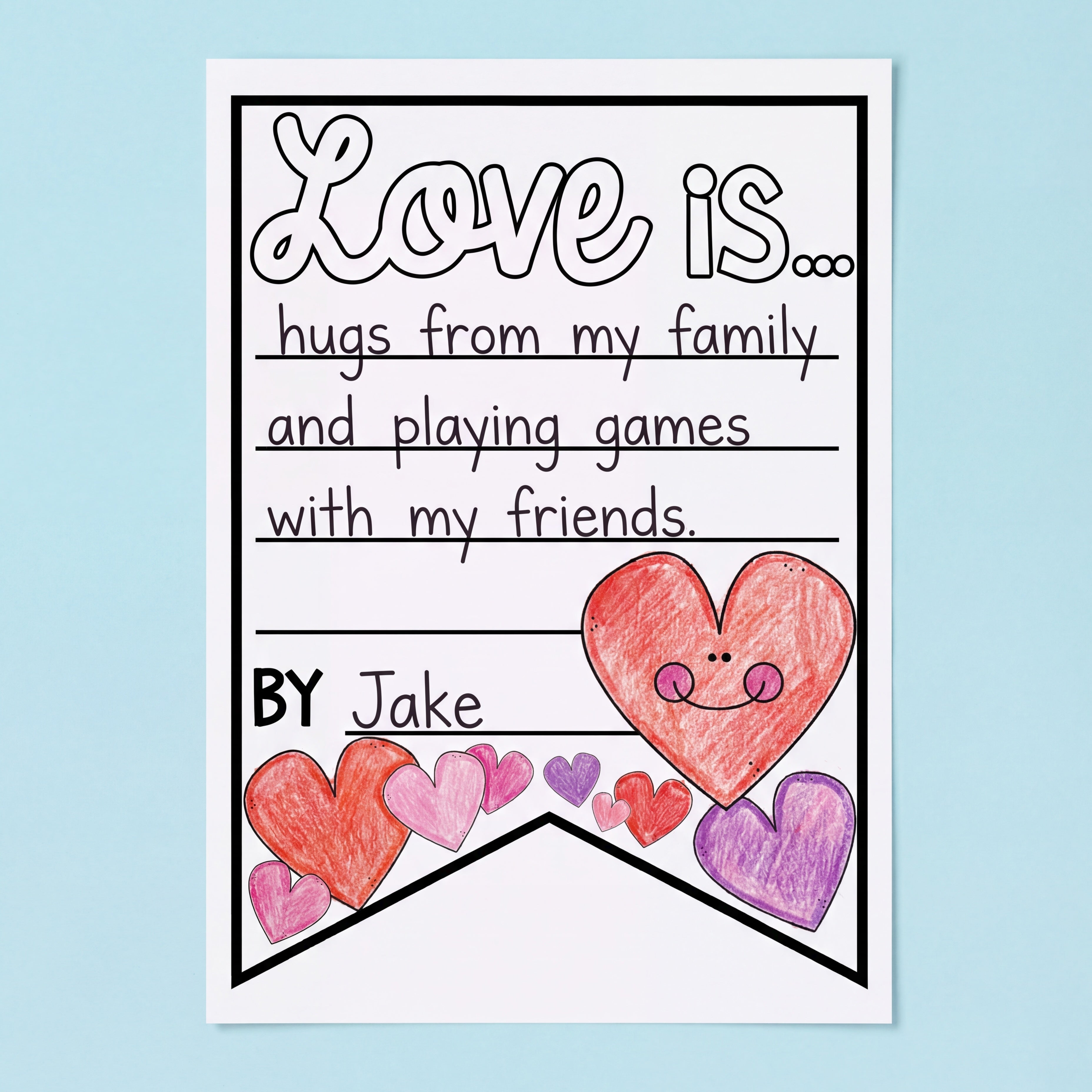 Two printable Valentine’s Day writing templates, one titled "Love is..." and the other "Things I love about...," with lined spaces for students to write about their favorite things. The templates are surrounded by colourful paper and crayons.