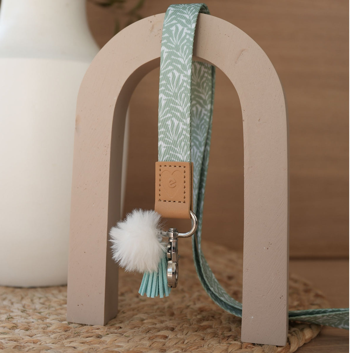 Olive Branches teacher lanyard by Krisztina Jung full length, silver clasp, white pom pom and mint tassel