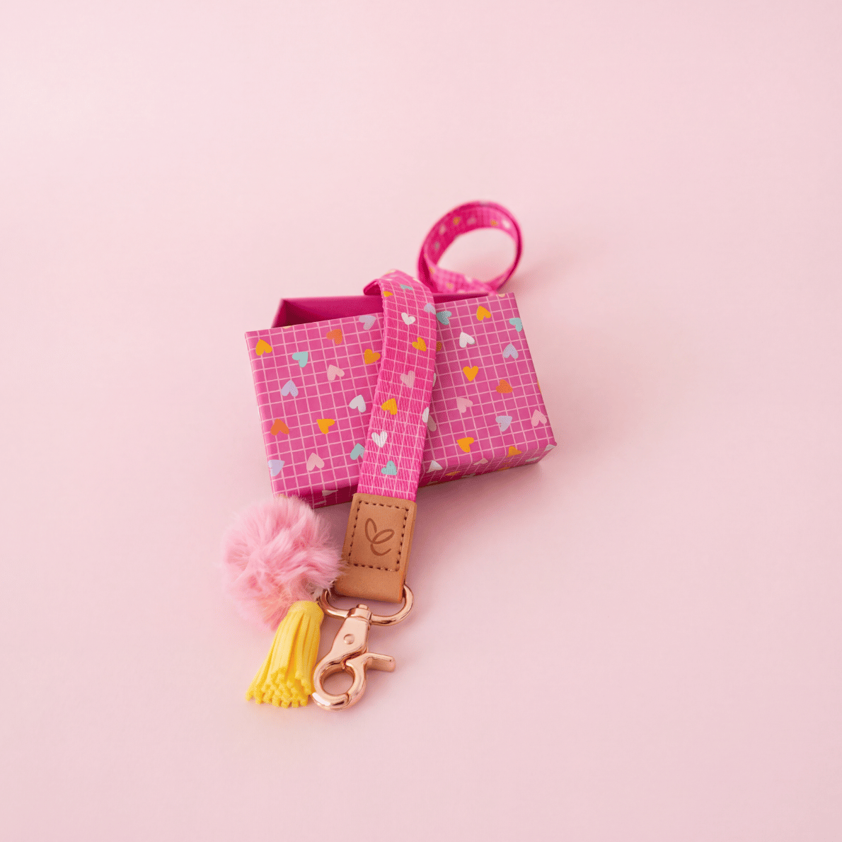 Teacher lanyard with pink heart pattern and keyring pouch, practical teacher accessory for keys, ID and classroom essentials