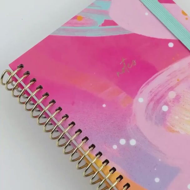 Notebook Solar Glow showing off design inside and outside of notebook