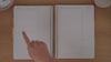 Daily teacher planner main daily spread shown in a flip-through