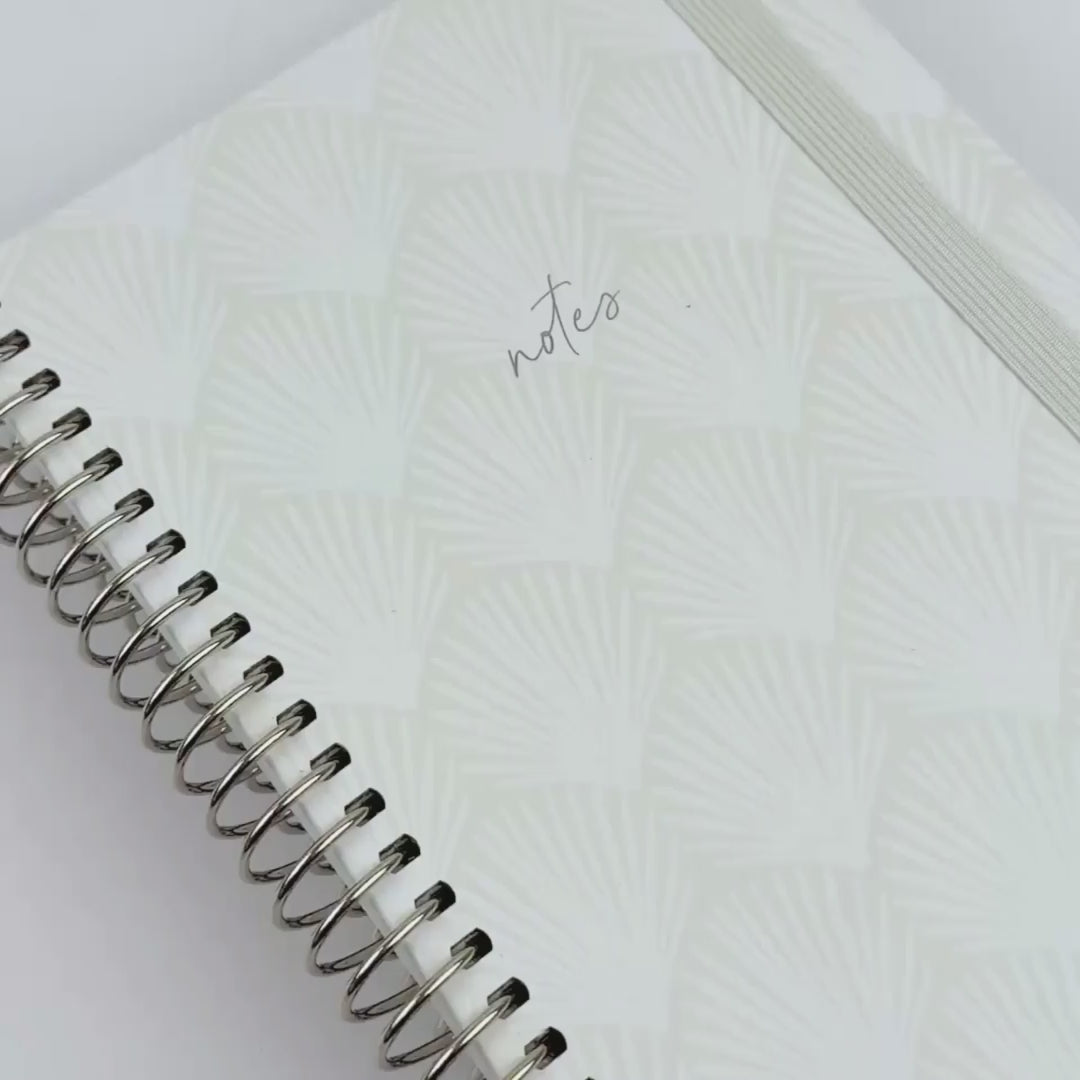 Shells notebook up close design being displayed through video 