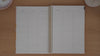 Slimline teacher planner main weekly spread shown in a flip-through