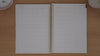 Slimline teacher planner term overview pages shown in a flip-through