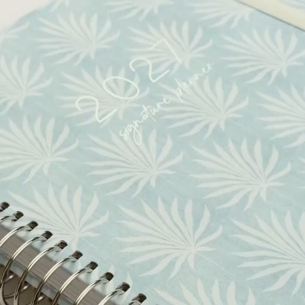video of 2027 teacher planner Palms showing off colour, design and artwork