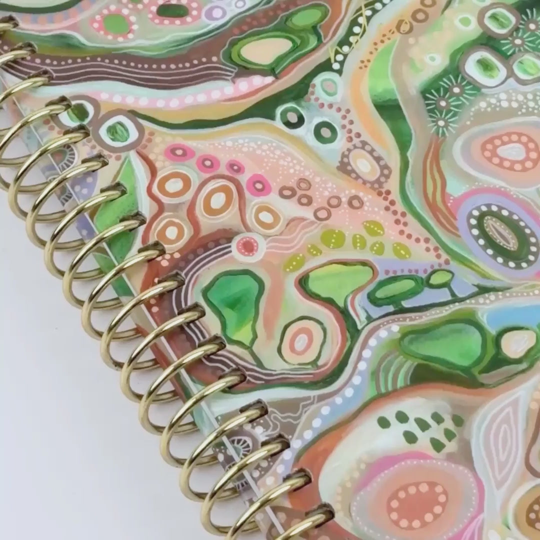 video showing off the notebook 'Sacred Grandparent Tree' beautiful design