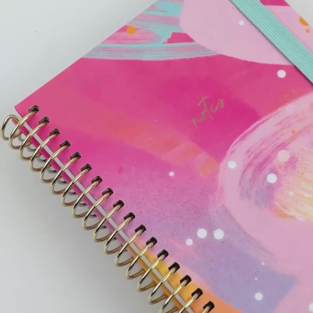 Notebook Solar Glow showing off design inside and outside of notebook
