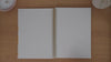 Slimline teacher planner graph paper pages shown in a flip-through